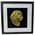 Framed cavapoo wall art with gold relief portrait on a black background, presented in a black frame with white mount on a pure white background