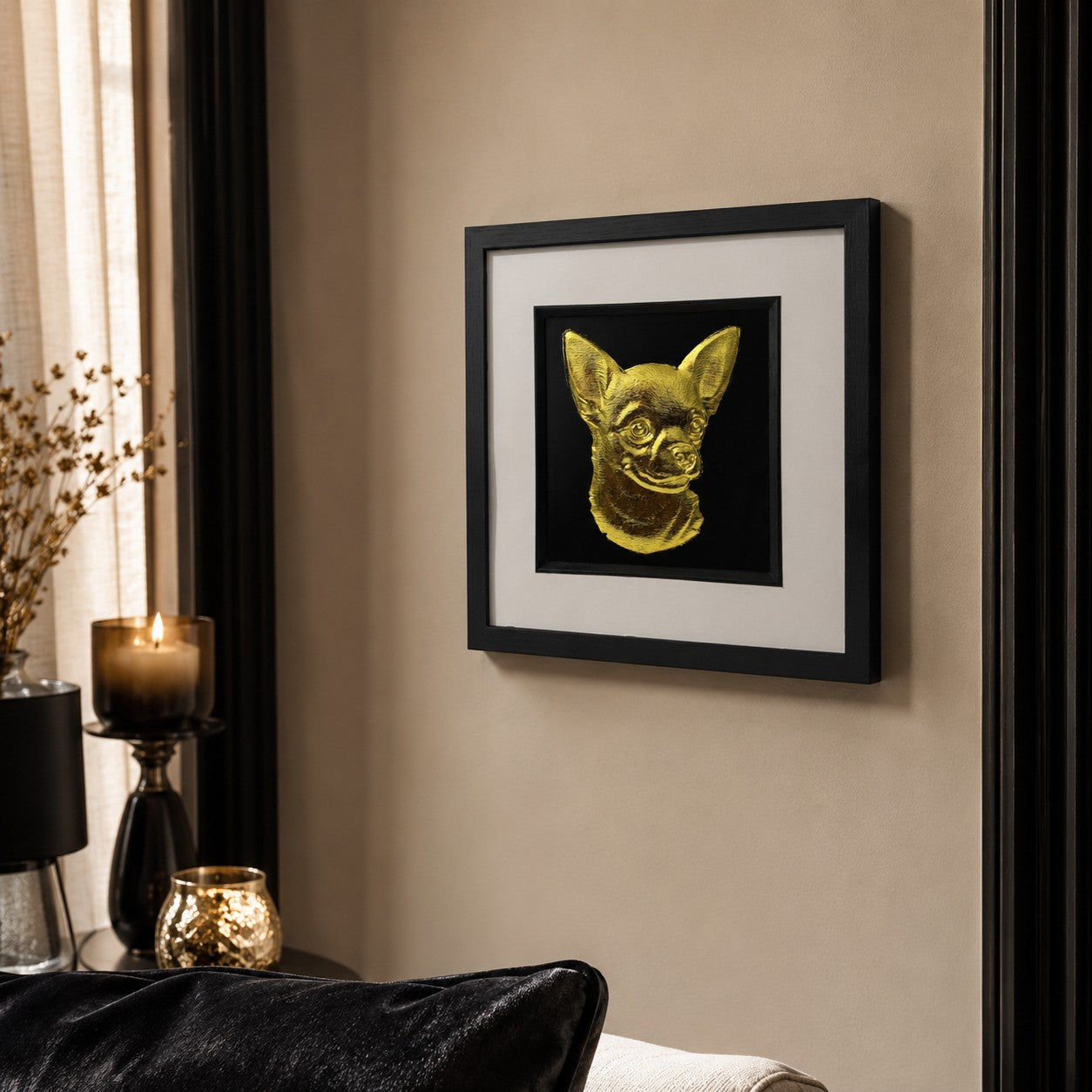 Angled lifestyle view of Chihuahua gold 3D relief dog wall art in a black frame with white mount, styled on a neutral living room wall.