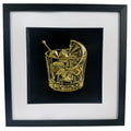 Front view of cocktail glass 3D relief artwork in Gold Leaf on black background with white mount in a black box frame