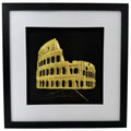 Gold Colosseum raised relief in a black frame with white mount, black inner surround, and glass front on a white background.
