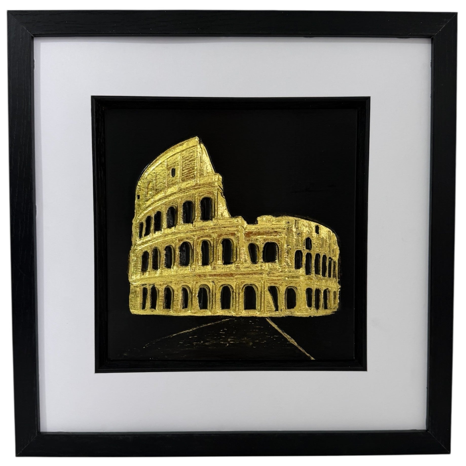 Gold Colosseum raised relief in a black frame with white mount, black inner surround, and glass front on a white background.