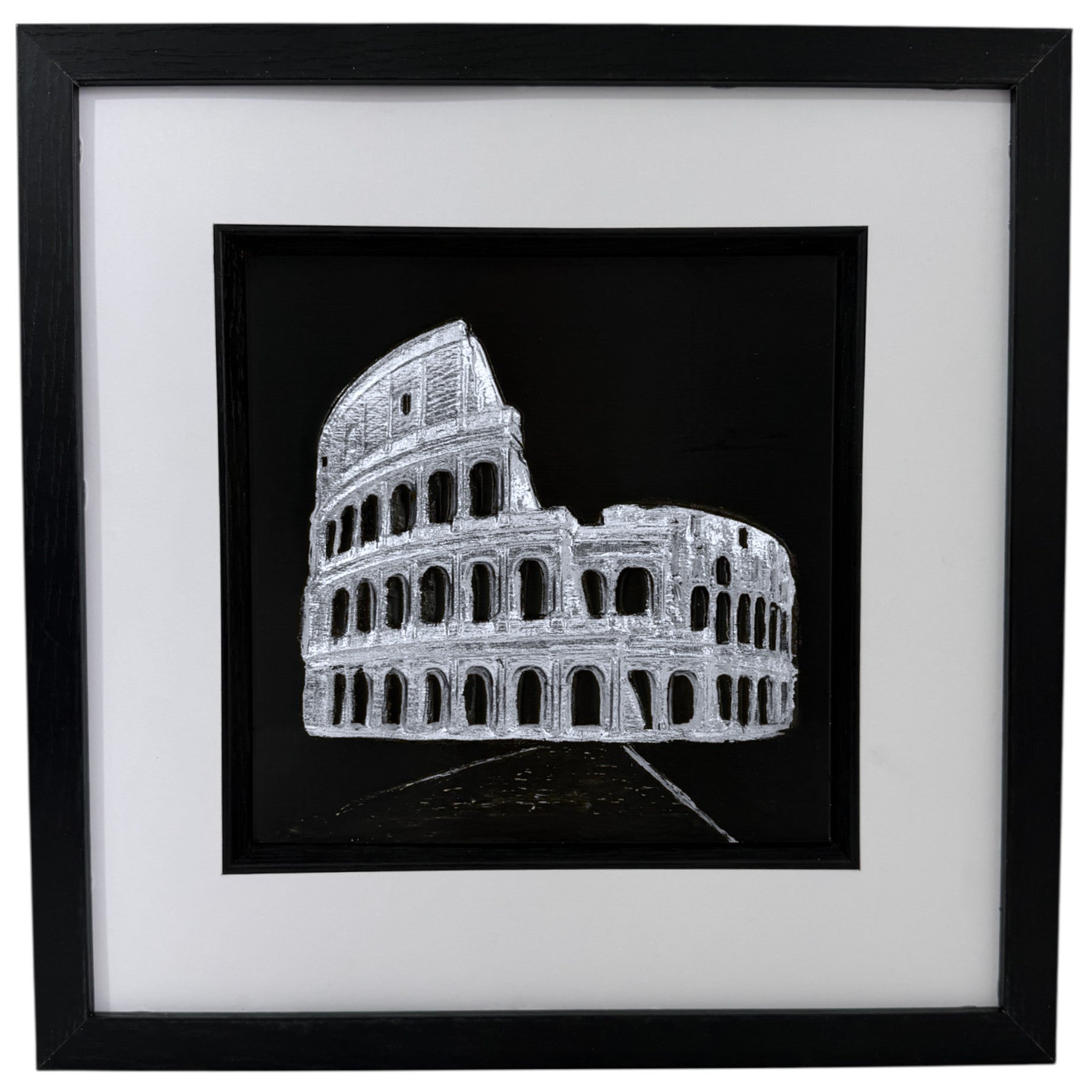 Silver Colosseum raised relief in a black frame with white mount and black inner surround on a white background.