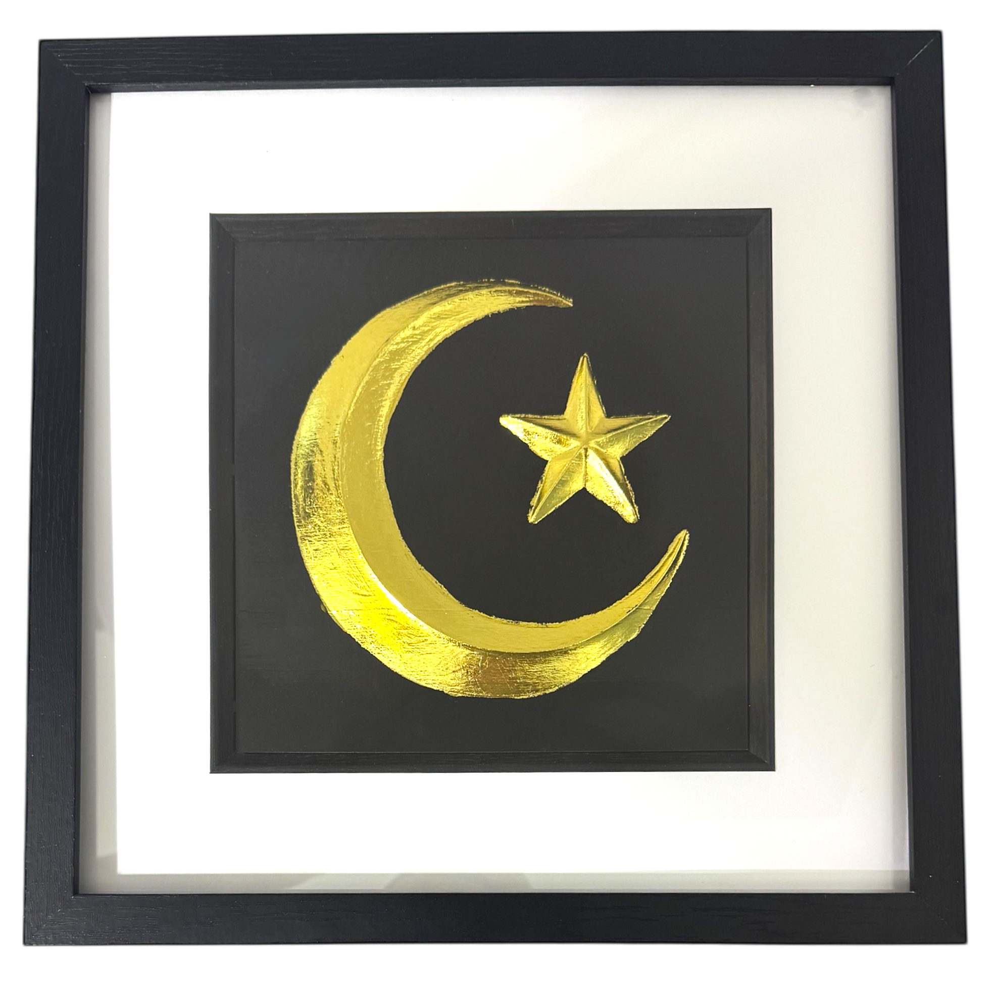 Gold crescent moon and star wall art on black background with white mount