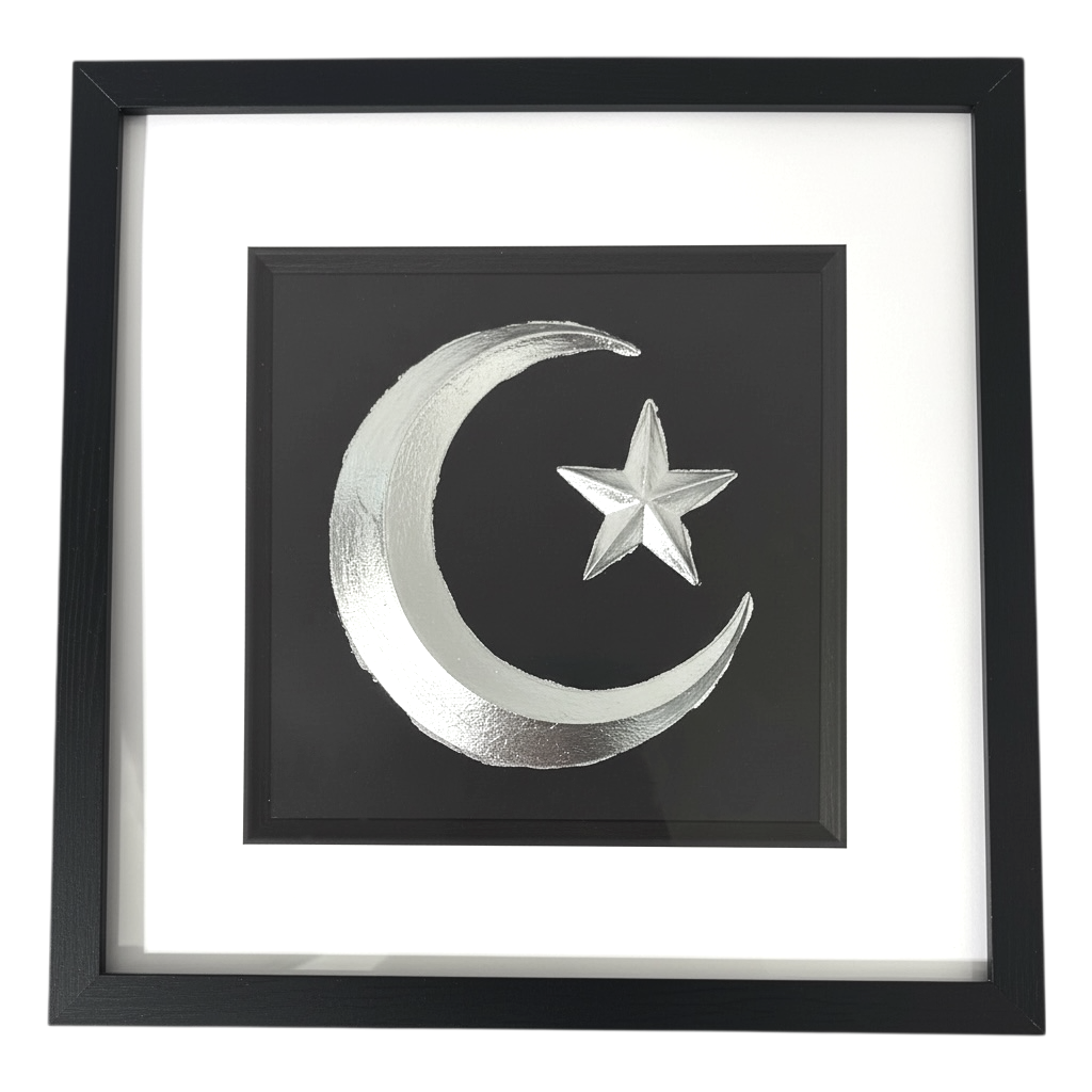 Silver crescent moon and star wall art framed in black