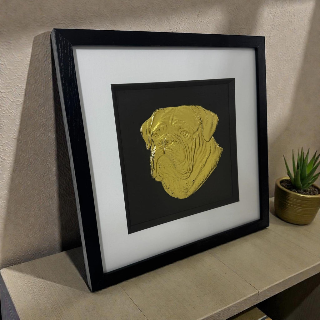 dogue de bordeux gold portrait on a mirrored desk surface in a black wooden frame
