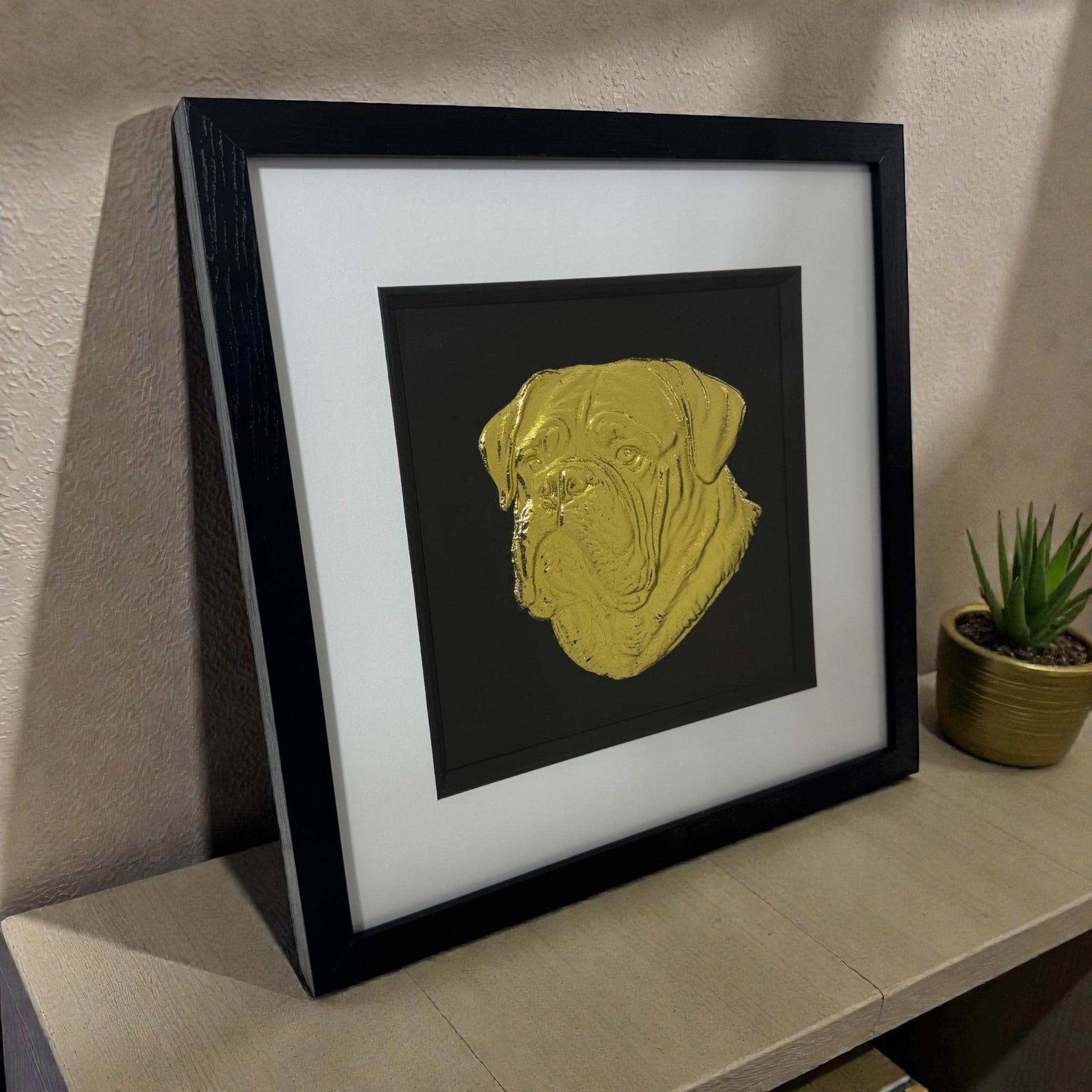 dogue de bordeux gold portrait on a mirrored desk surface in a black wooden frame