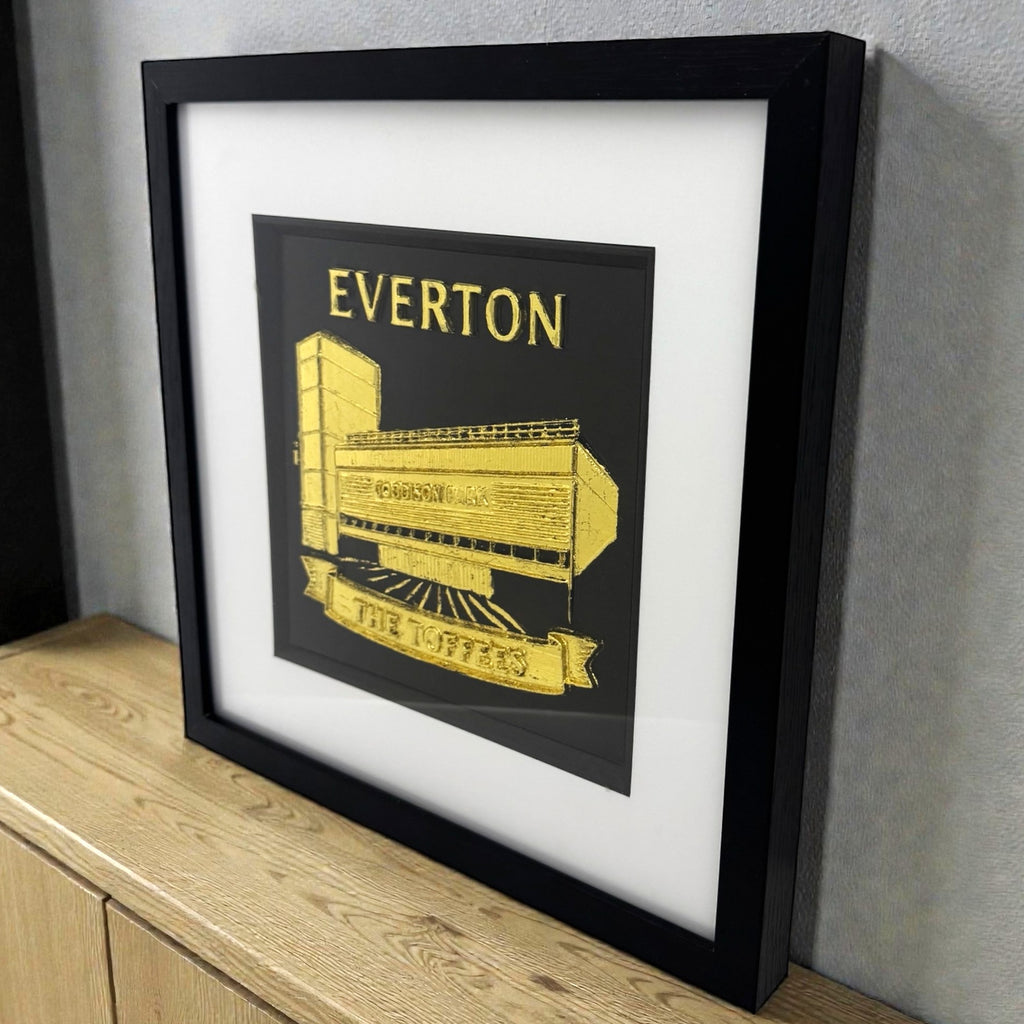 Everton football gift Goodison Park relief wall art in gold leaf shown styled on a desk