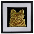 Straight-on gold fluffy French Bulldog portrait in a black frame with white mount and black inner surround.