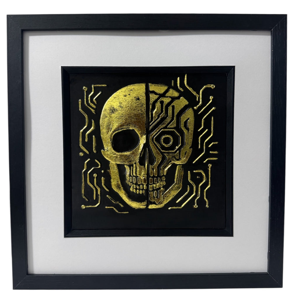 Futuristic half mechanical skull wall art in gold leaf on black background