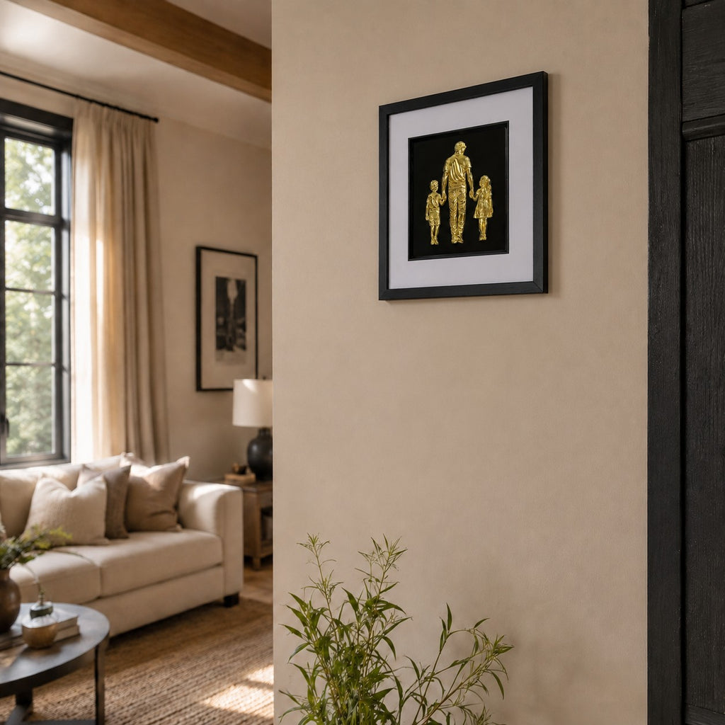 Gold father, son and daughter framed artwork styled in a warm living room with plants and neutral decor.
