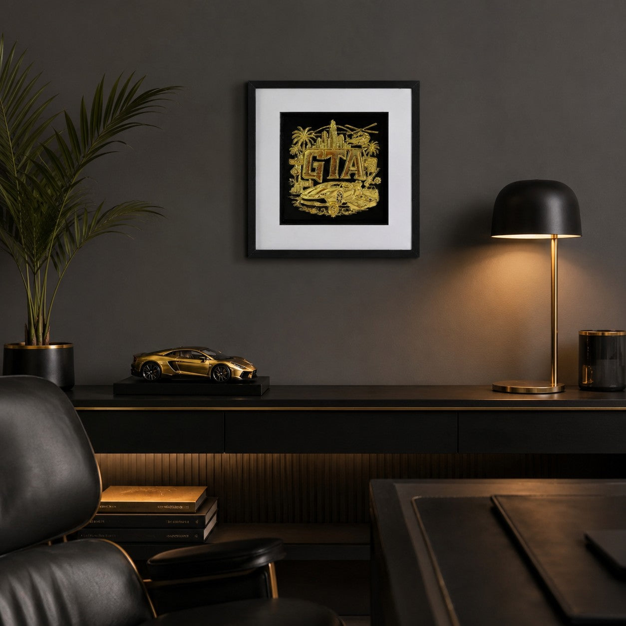Gold framed grand theft auto 3D gaming wall art styled in a dark room above a sideboard with a lamp, plant and model sports car.