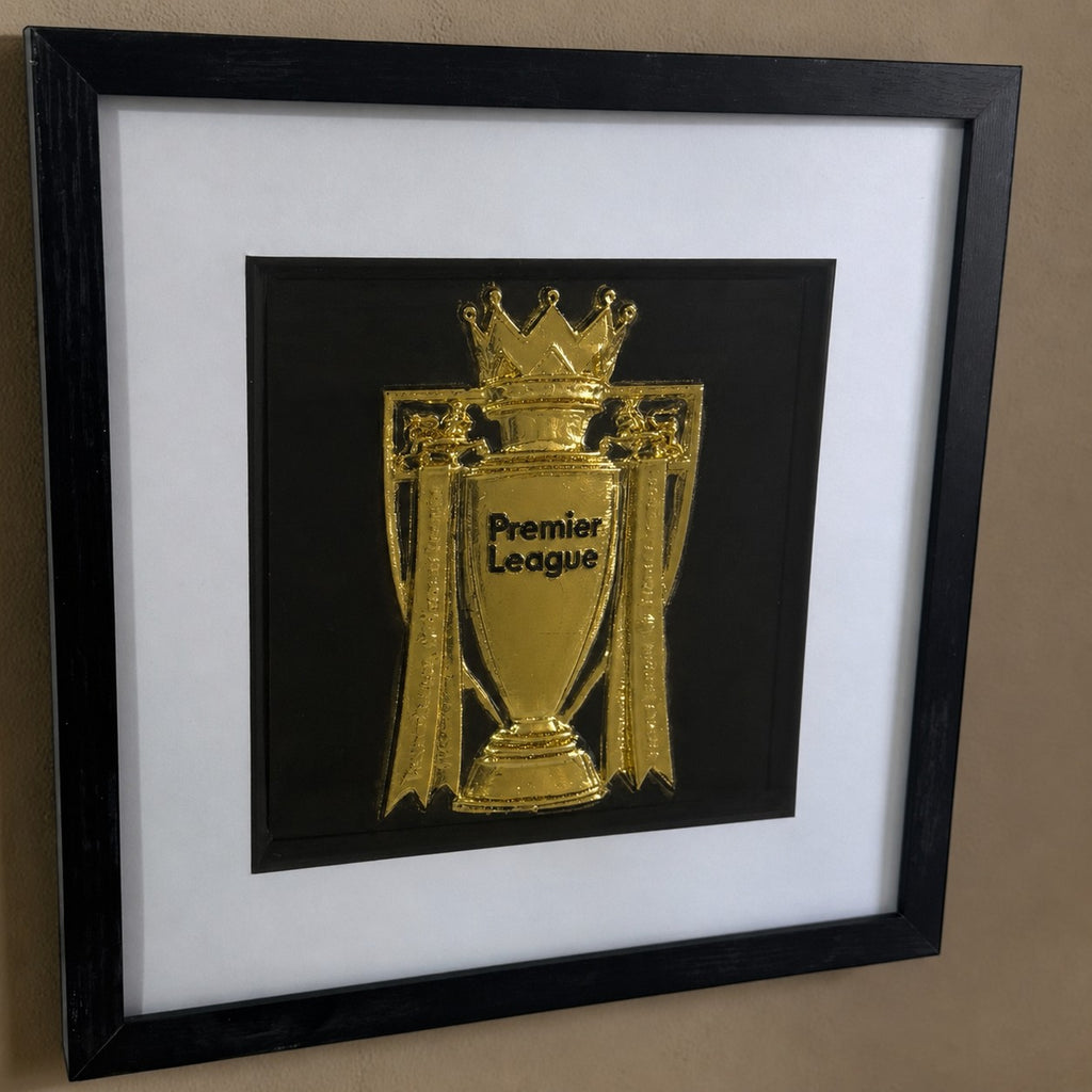 Gold Premier League trophy framed 3D relief wall art shown at an angle in a black square frame with white mount
