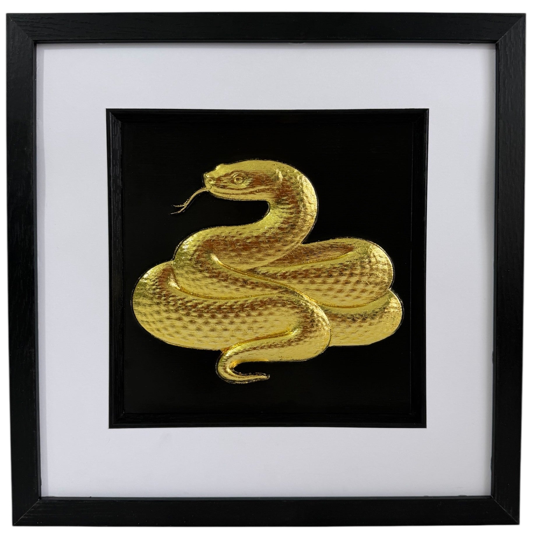 Gold framed snake relief artwork with coiled serpent, black centre, wide white mount and black square frame.