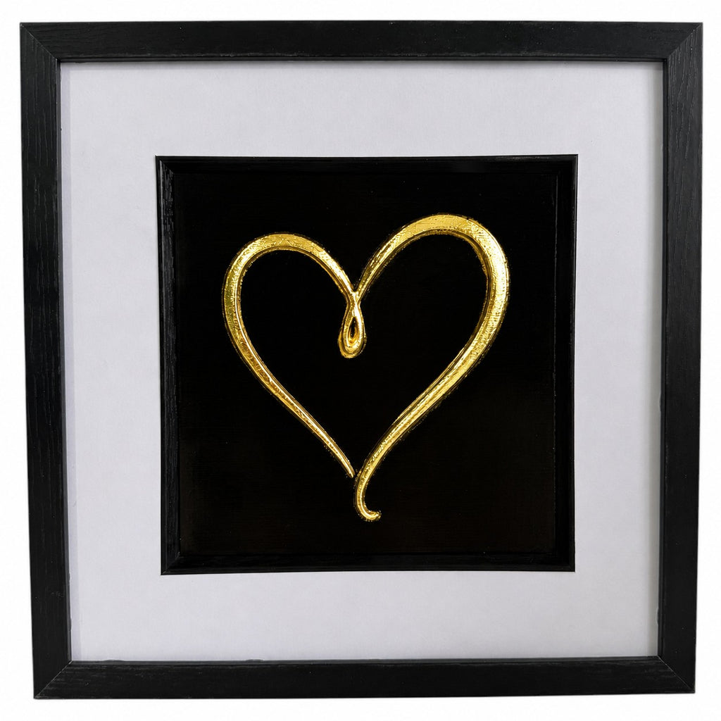 Straight-on Gold single-line heart relief artwork with black centre panel, white mount and black frame.
