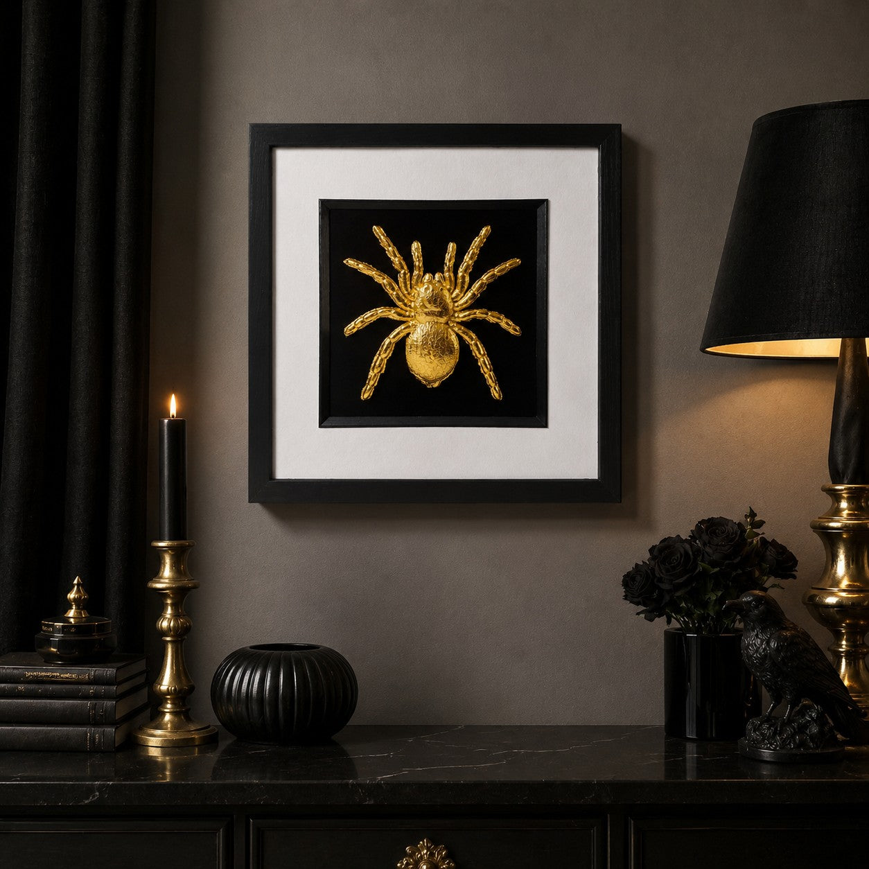 Gold tarantula spider framed wall art displayed in a moody gothic interior with black decor, candlelight, gold accents and a dark console table.