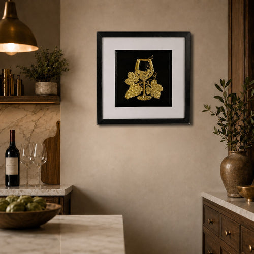 Gold wine wall art in a kitchen and dining setting with wine glasses, bottle styling and neutral walls.