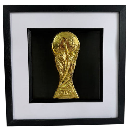 Gold World Cup trophy inspired 3D football wall art in a black box frame with white mount and black inner surround.