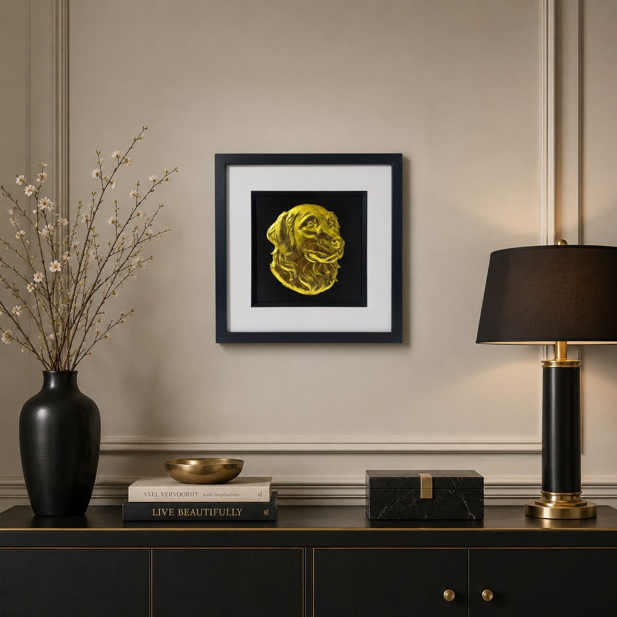 Golden Retriever 3D wall art with gold leaf detail, black frame and white mount, displayed on a warm neutral living room wall.