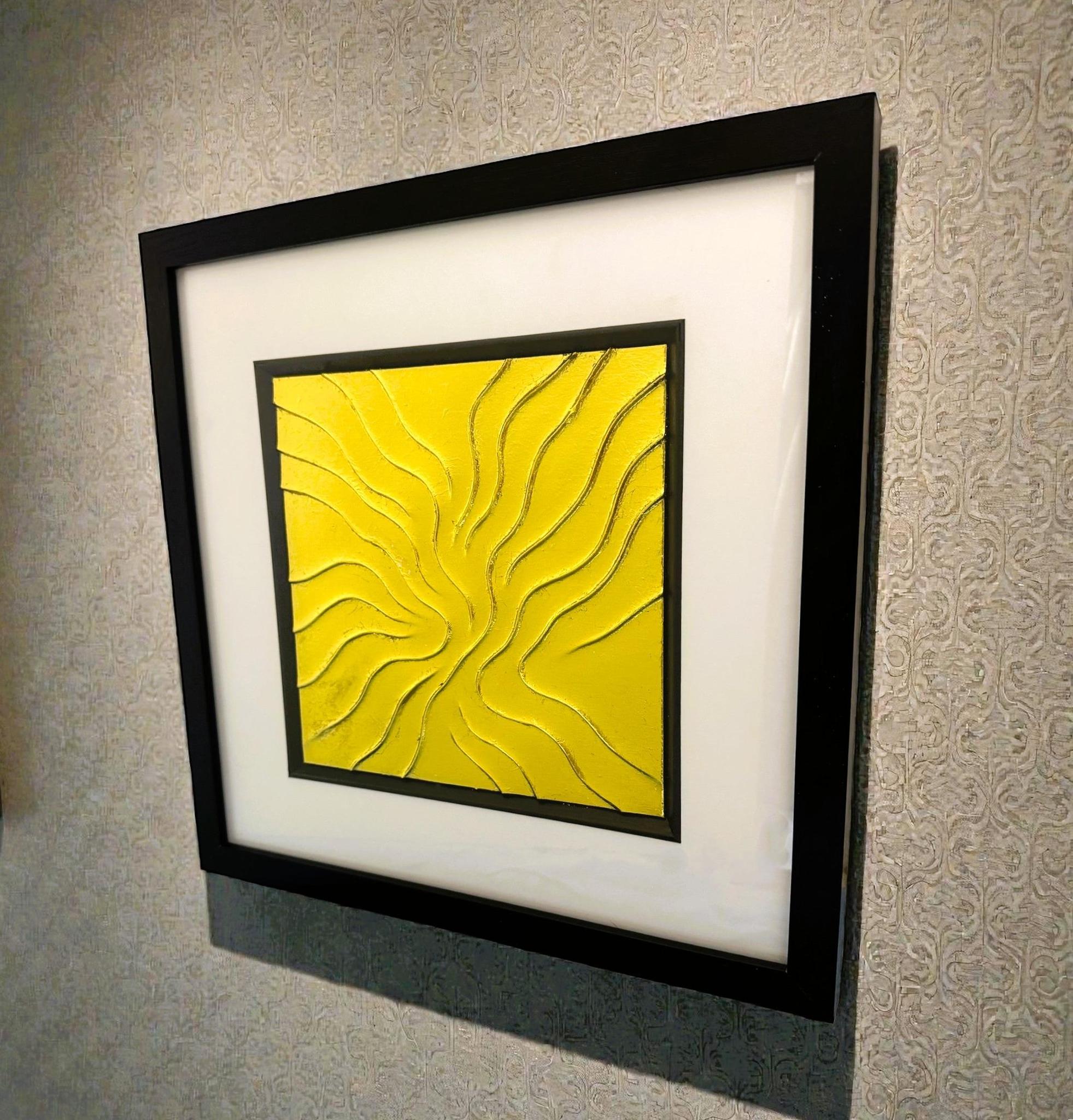 Framed abstract artwork with flowing sculpted lines on black background on wall
