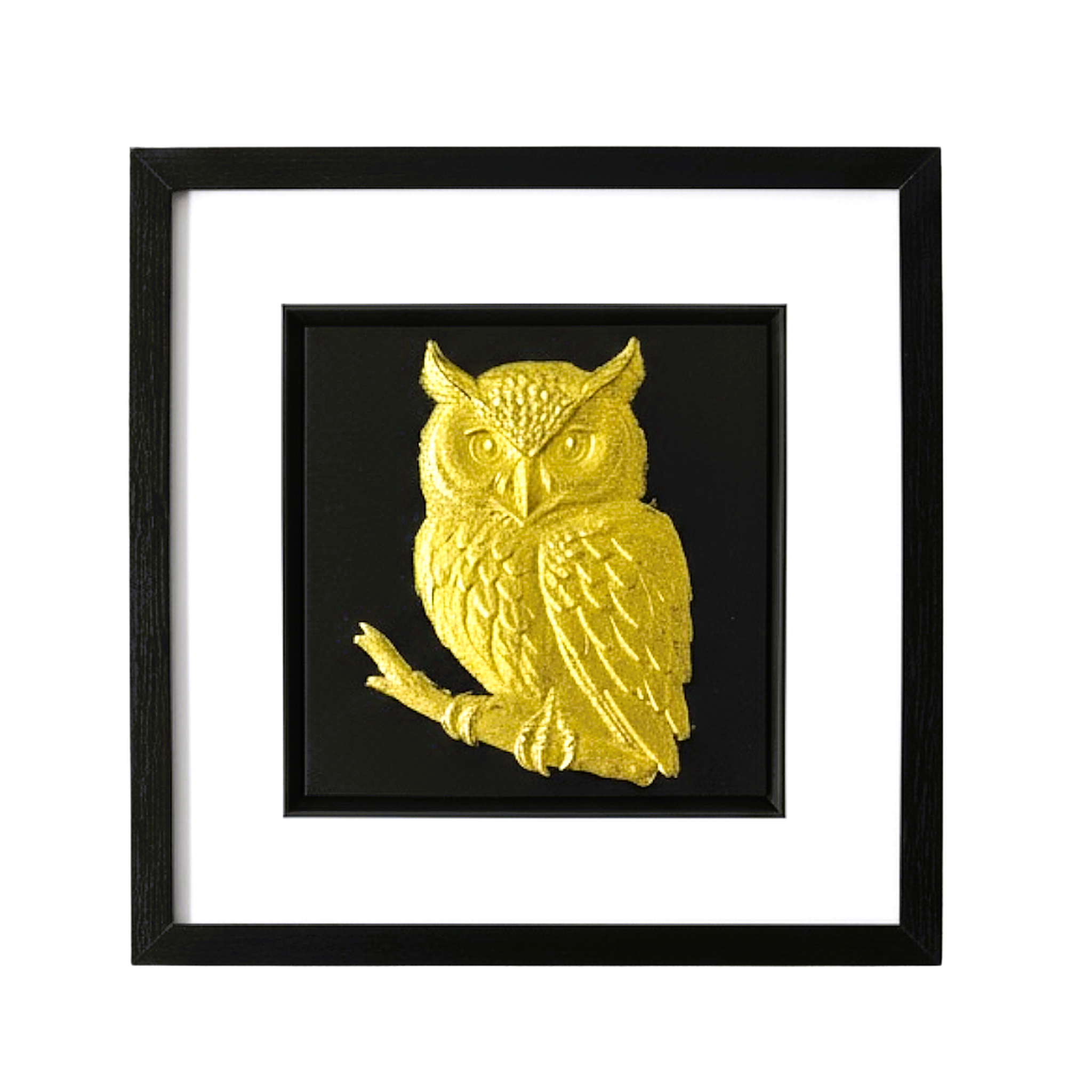 Front-facing gold leaf owl wall art with black background and white mount