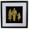 Straight-on Gold framed family relief artwork with black background, white mount and black box frame.