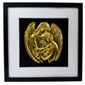 Framed gold leaf guardian angel wall art showing an angel embracing and comforting a grieving person on a black background.