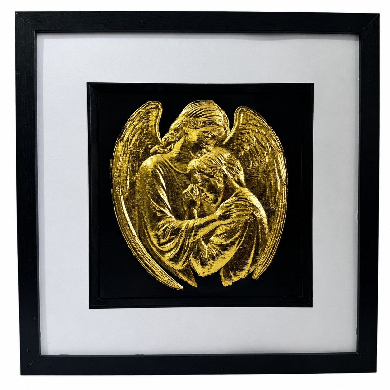 Framed gold leaf guardian angel wall art showing an angel embracing and comforting a grieving person on a black background.