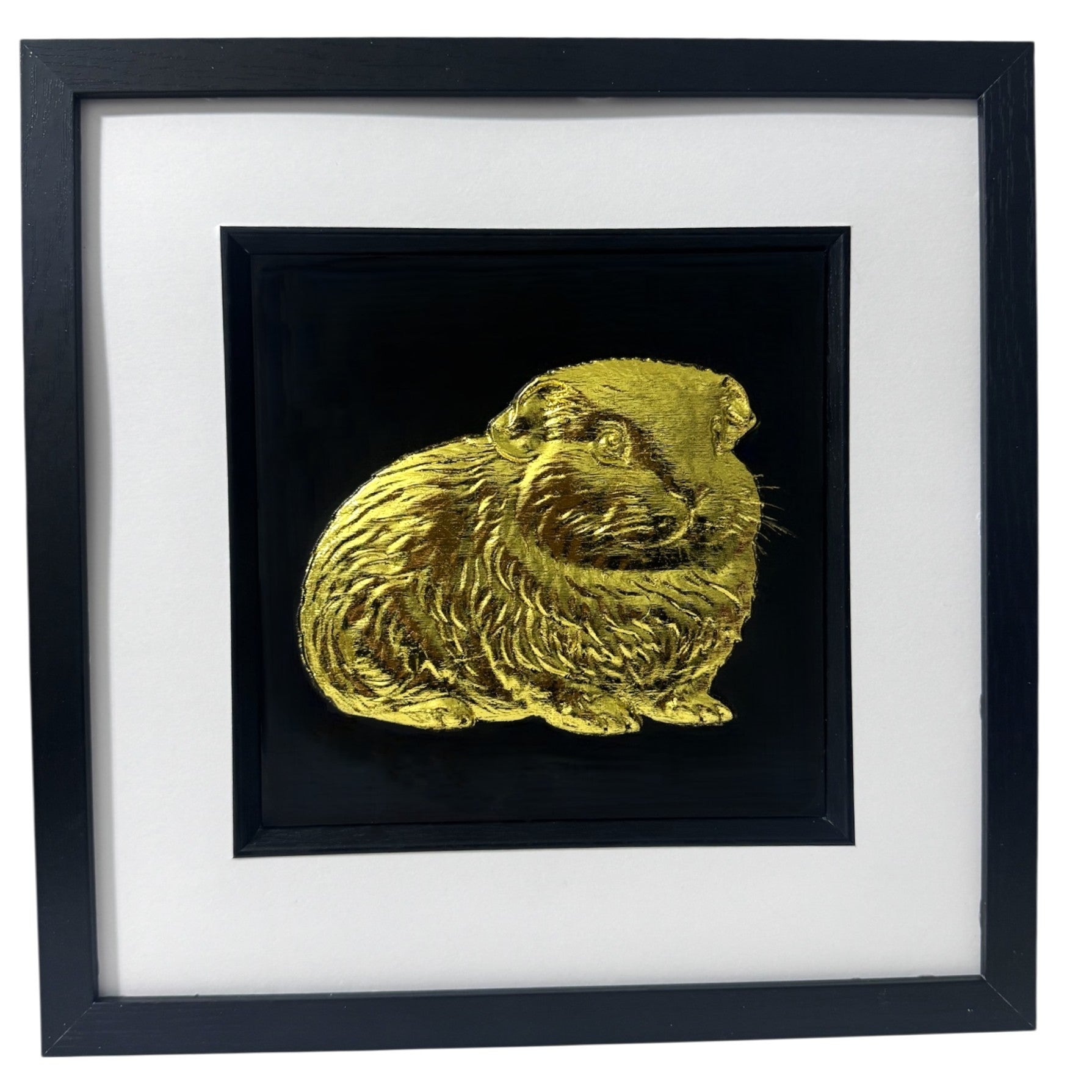 A luxury 3D relief sculpture of a Guinea Pig finished in metallic gold leaf, highlighting the textured fur details against a black background.