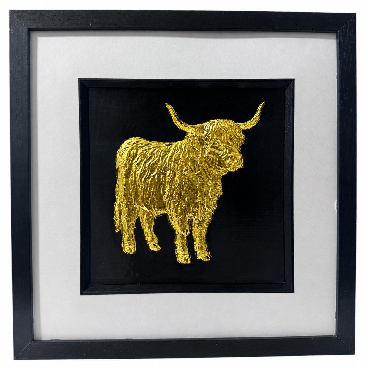 Gold Highland cow wall art framed in black with white mount