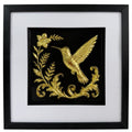 Straight-on Gold hummingbird artwork with raised bird, flower and scrolling leaves inside a black frame