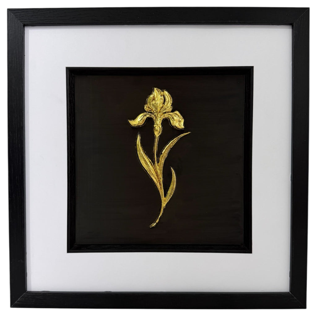 Gold iris raised relief in a black frame with white mount and black inner surround on a white background.