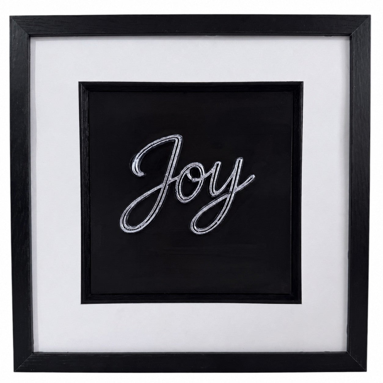 Silver framed Joy word artwork with raised script lettering, black centre, white mount and black frame.