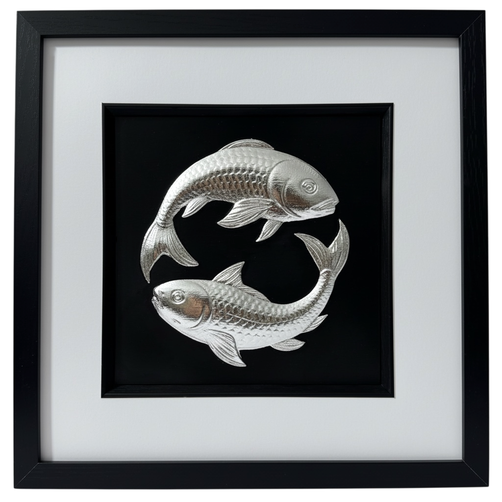 A luxury 3D relief sculpture of two Koi Carp swimming in a Yin Yang circle, finished in metallic silver leaf and framed in black. 
