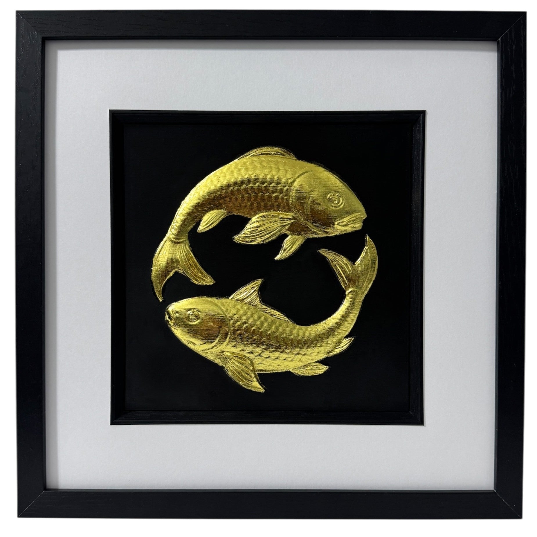 A luxury 3D relief sculpture of two Koi Carp swimming in a Yin Yang circle, finished in metallic gold leaf and framed in black.