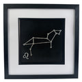 Silver Leo constellation wall art on black background with white mount