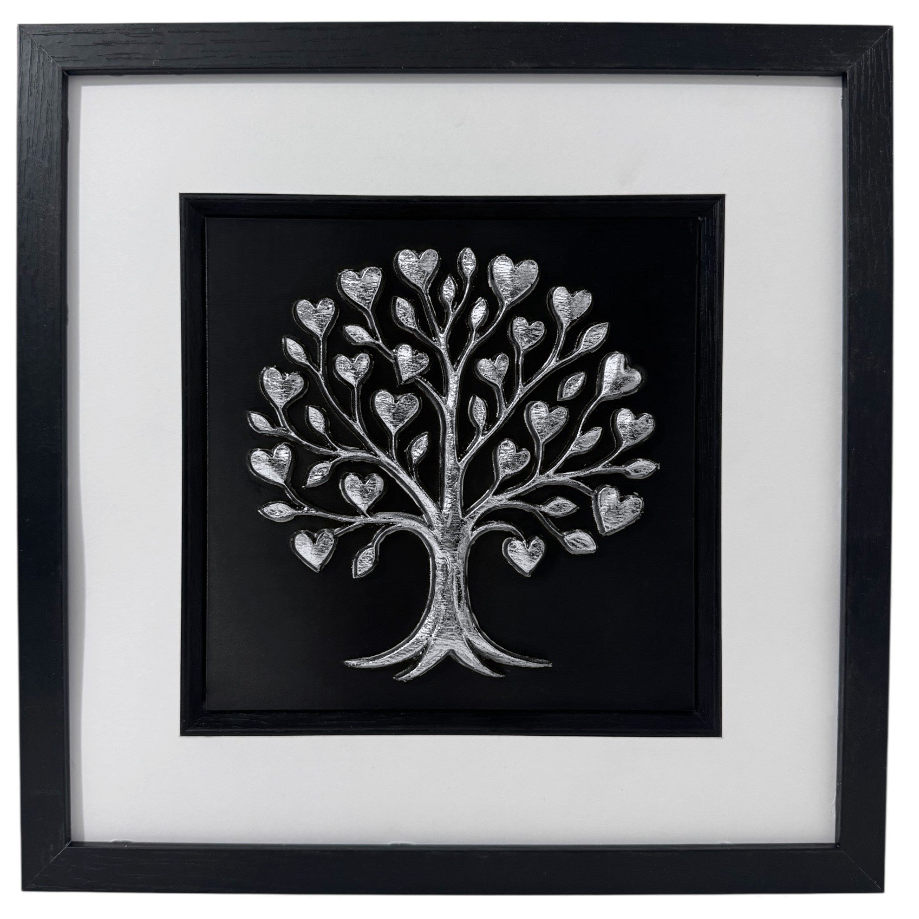 Silver tree of life relief with heart-shaped leaves in a black box frame with wide white mount and black inner surround