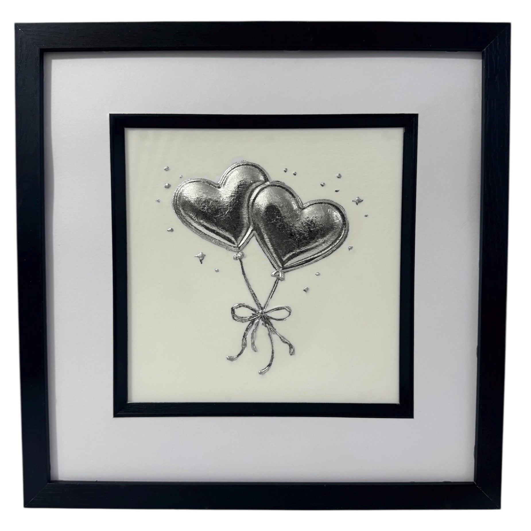 Front-facing silver leaf heart balloons framed wall art with white mount and Ivory background