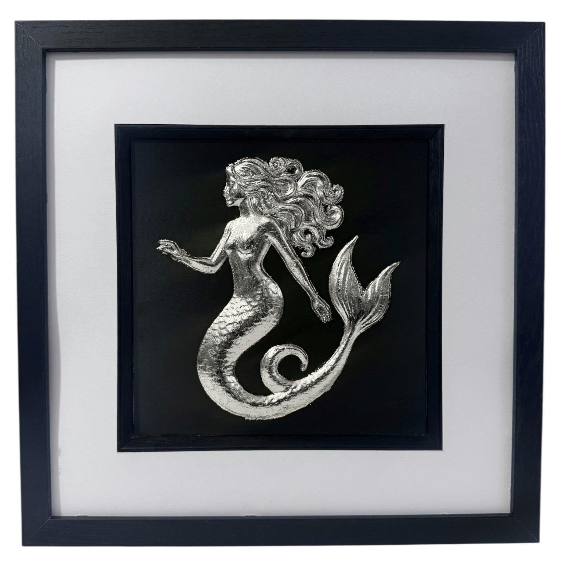 Silver mermaid wall art framed in black with white mount