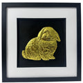 Framed Mini Lop rabbit 3D wall art in gold leaf, in a black wooden frame with white mount on a black background.