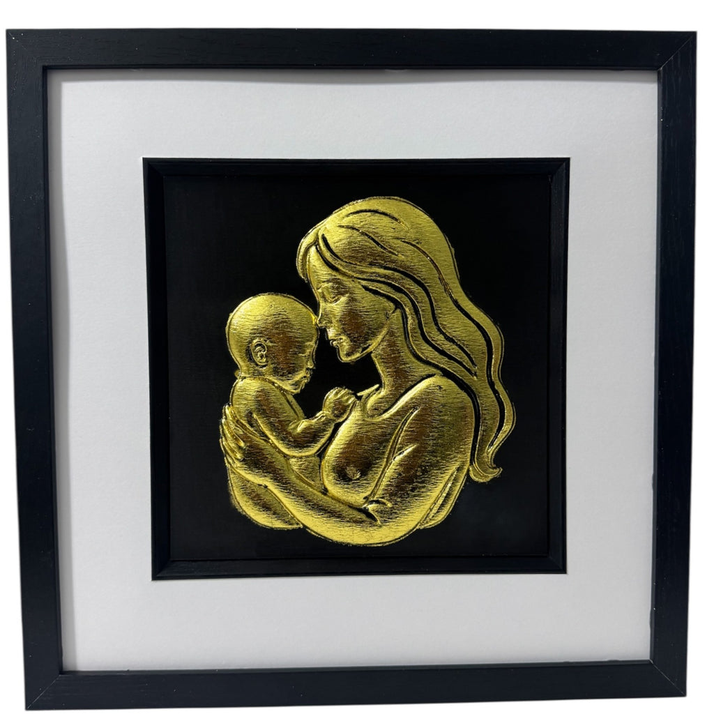 Mother and baby wall art framed in black with gold leaf relief on black background