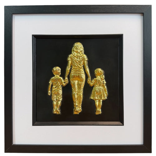 Mum, son and daughter framed wall art showing three sculpted figures walking hand in hand in gold leaf, set on a black background with white mount and black wooden frame