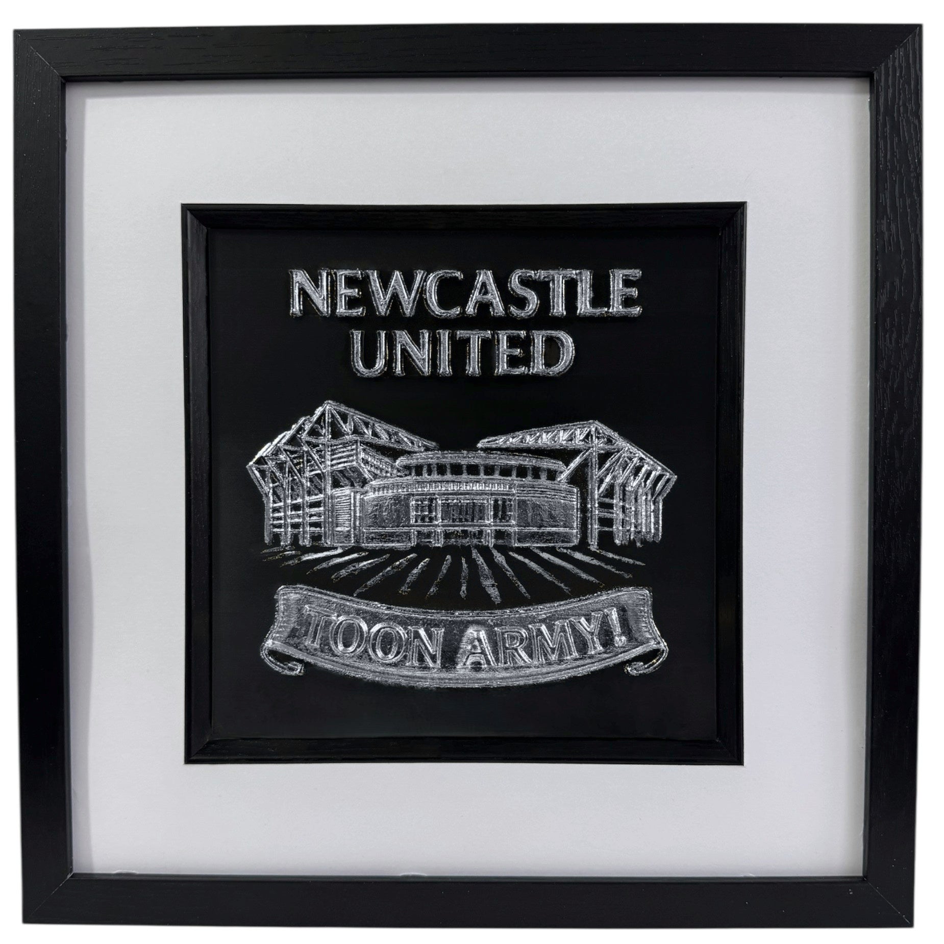 Silver 3D relief wall art of Newcastle United St James' Park on black background.