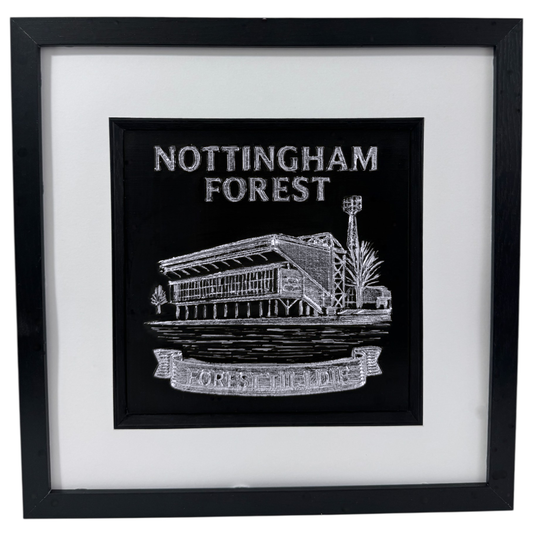 Nottingham Forest framed 3D stadium relief wall art in silver leaf, black box frame with white mount, front facing product photo.