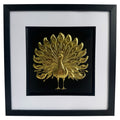 Gold peacock 3d wall art framed and centred against a white wall