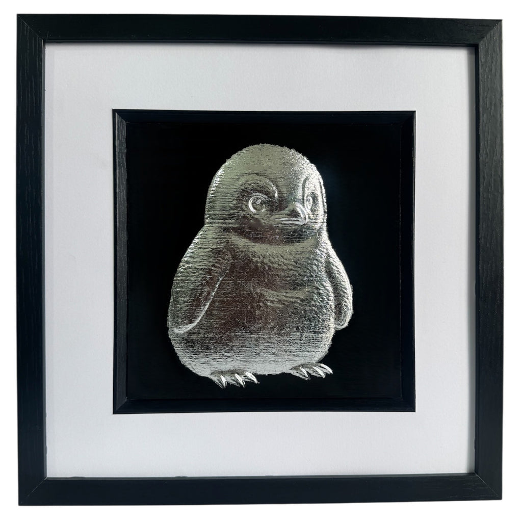Front view of silver baby penguin framed wall art 3d on black background nursery decor