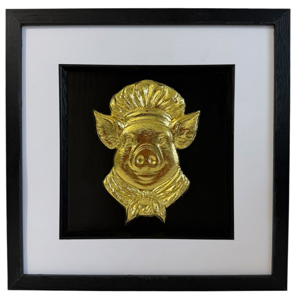 Gold pig chef raised relief in black square frame with white mount and black inner surround