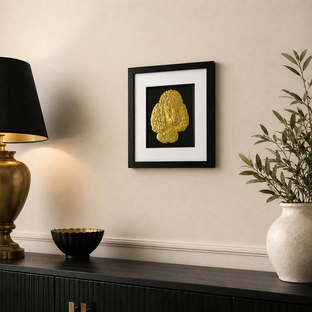 Poodle gold leaf framed dog wall art displayed in a neutral home interior with black frame, white mount, black background, and warm gold accents.