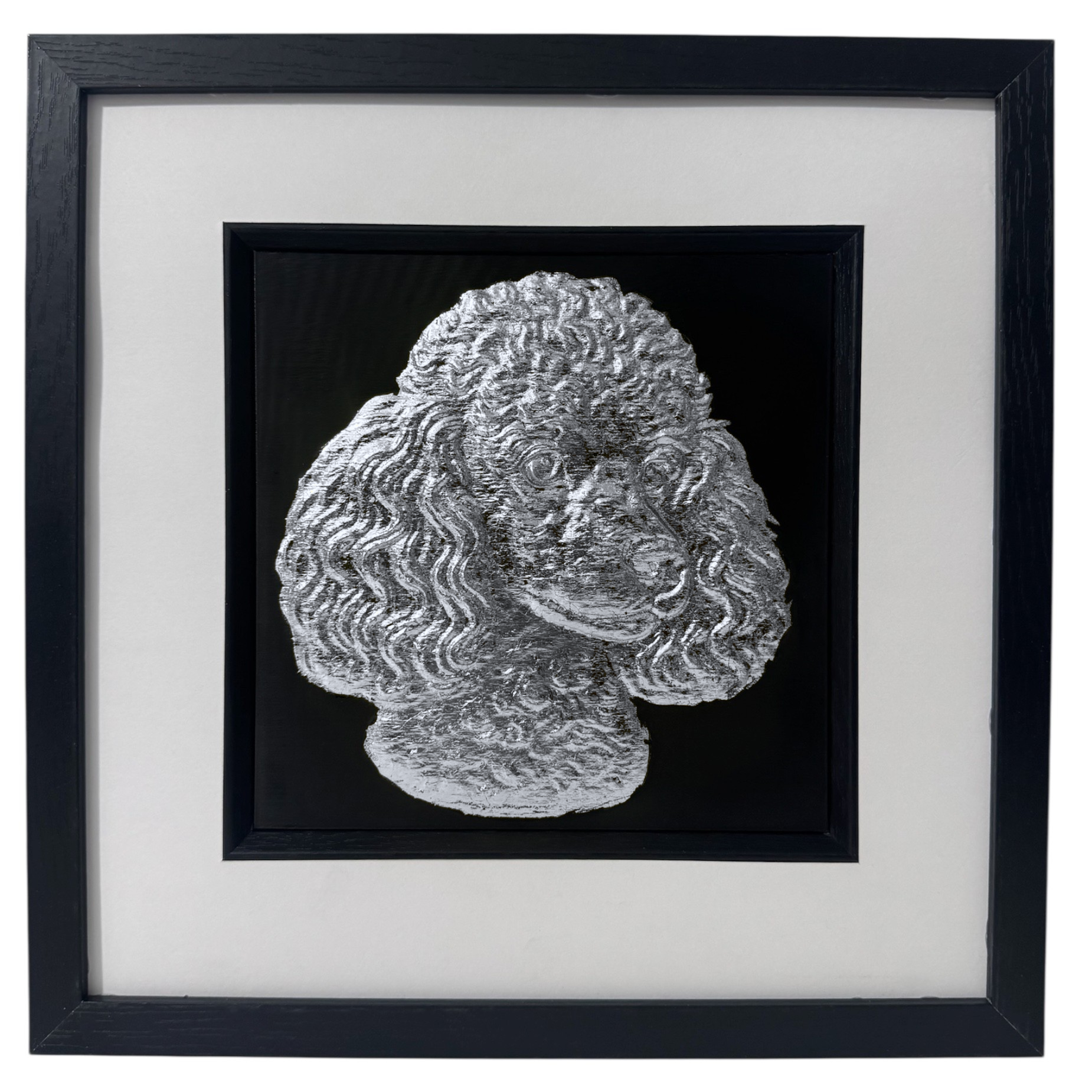 Poodle framed wall art in silver leaf shown front on with black wooden frame white mount and black background