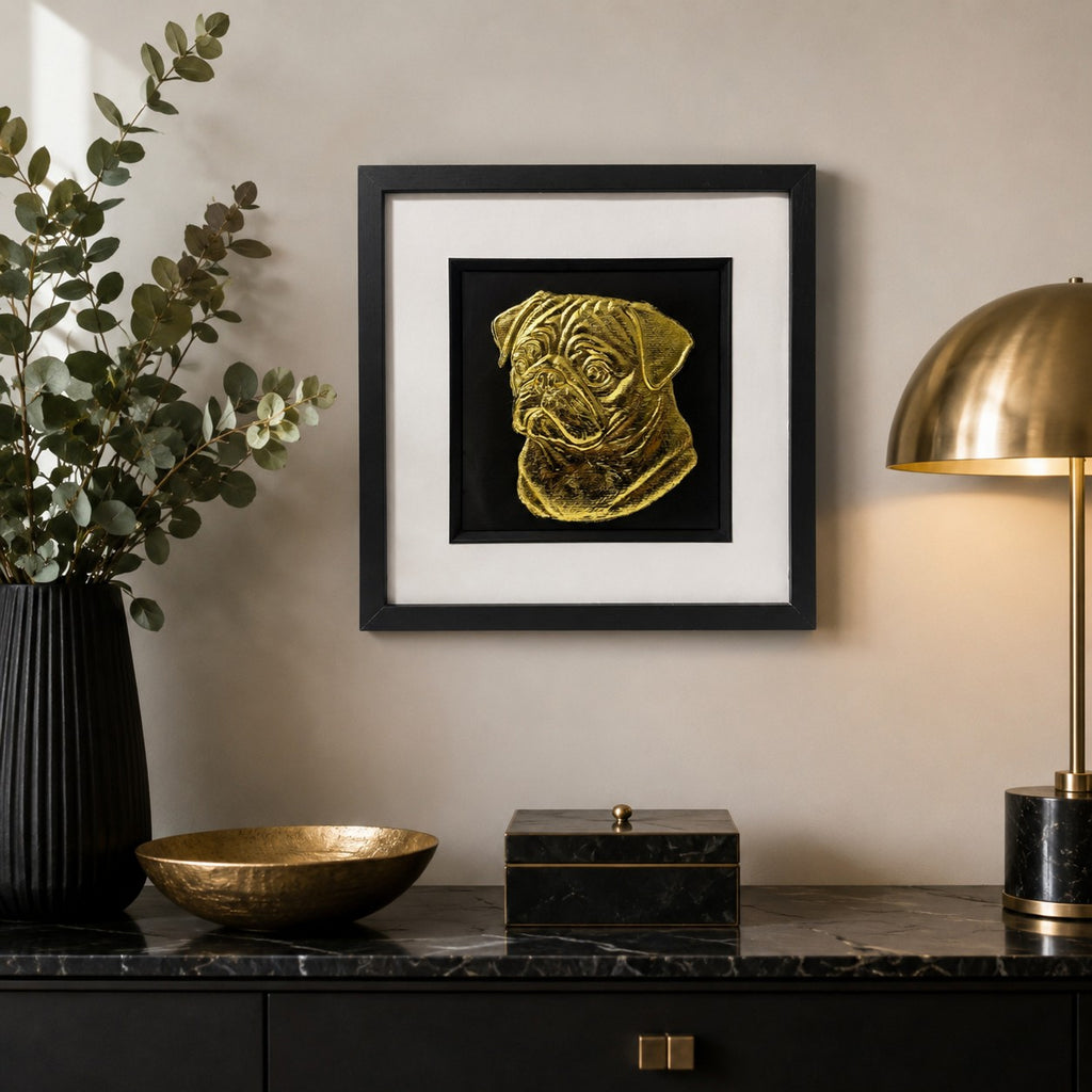 Pug gold leaf framed dog wall art displayed in a modern neutral home interior with black frame, white mount, black background, and warm gold accents.