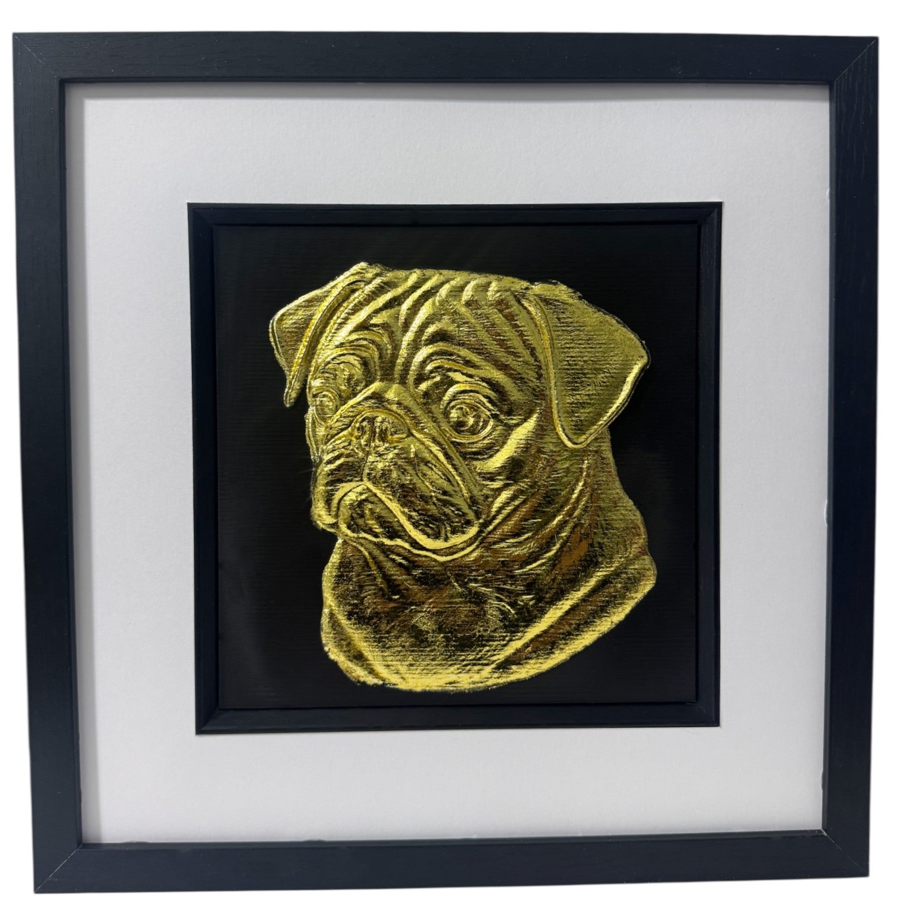 Pug framed wall art in gold leaf shown front on with black wooden frame white mount and black background